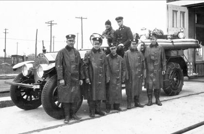 Village of Center Line, Michigan Volunteer Fire Department members shown in front of their 1926 American La France Pumper